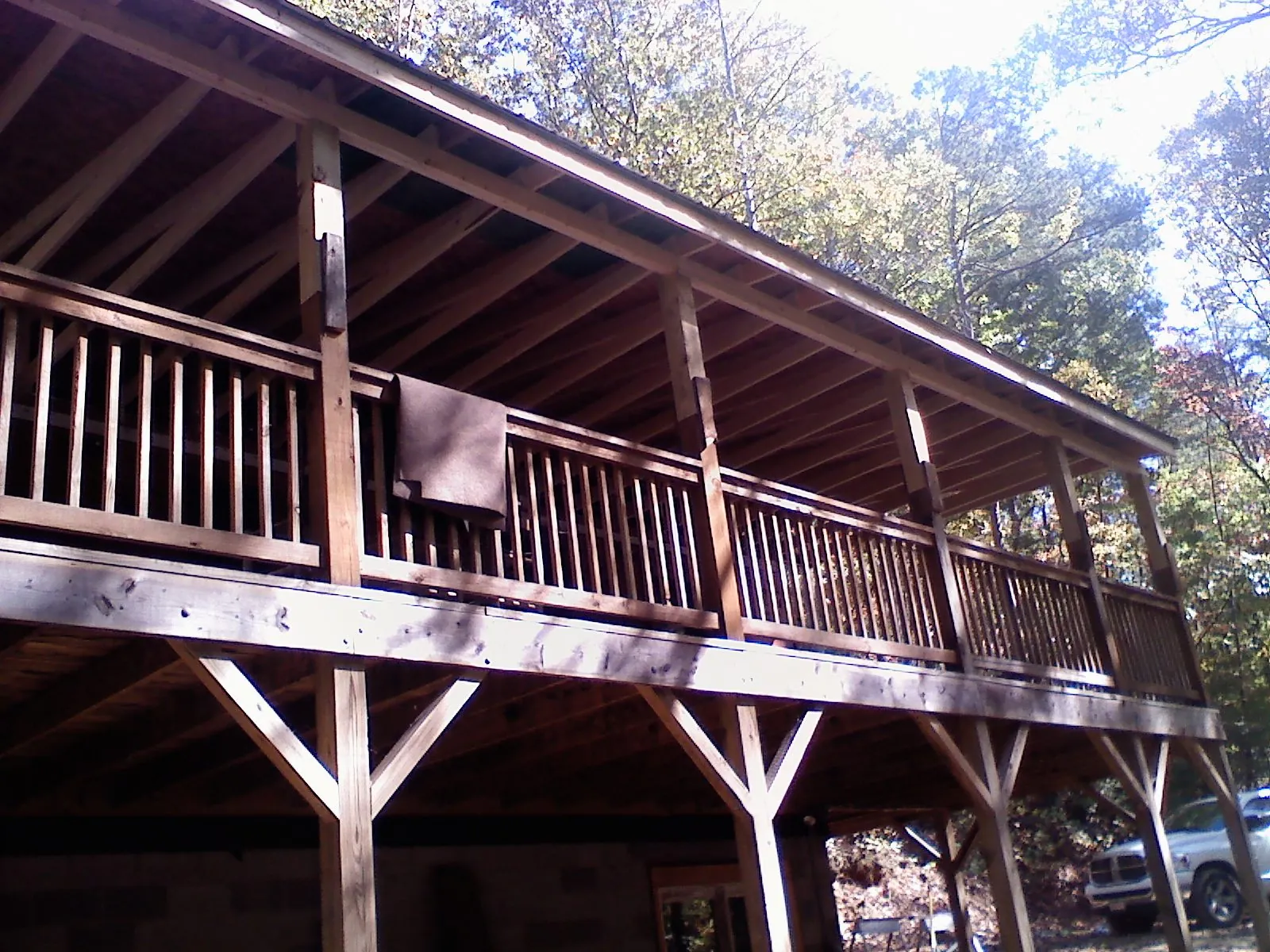 Timber framing under a new elevated porch and deck — Roof Leak Repair in Benton Harbor by Roofing Brothers